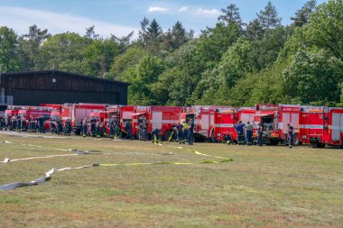 Firefighters prepared for training on small airfield