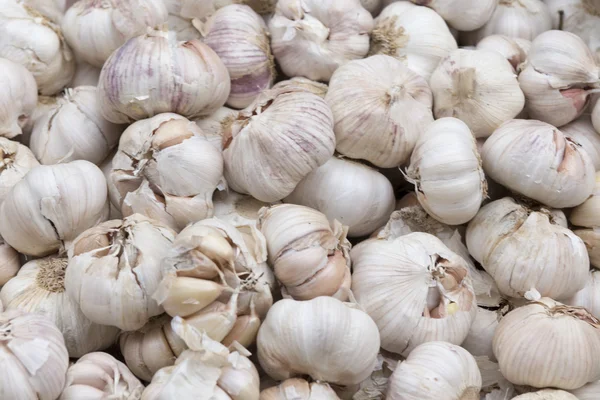 Bulk of garlic texture background — Stock Photo, Image