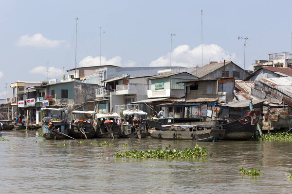 poor residential houses and boats