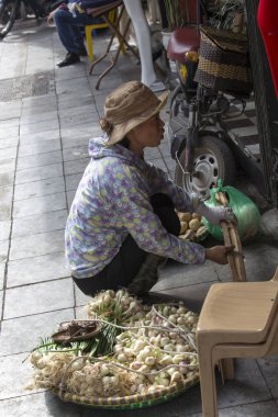 food vendor in the street of Hanoi, Vietnam