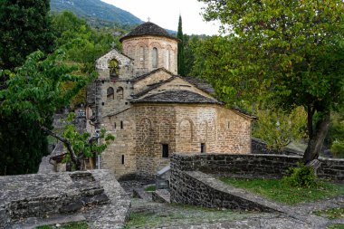 View of the greek-orthodox Church of the Holy Apostles in the village of Molivdoskepastos, in Epirus, Greece clipart