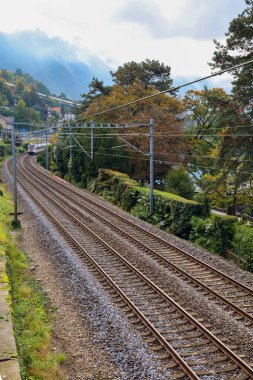 Montreux ,Switzerland-October 23,2019:The train on railway in front of  Lake Geneva in Montreux at switzerland