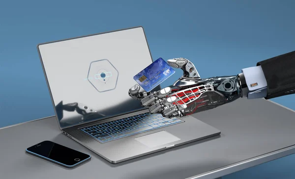 Um robô fazendo compras online com um cartão de crédito — Fotografia de Stock