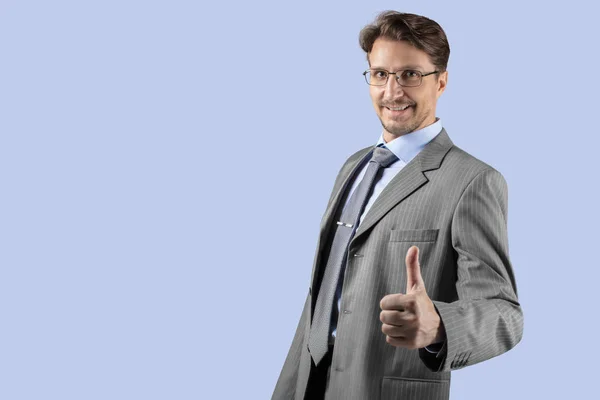 Businessman in gray suit smiling and thumb up — Stock Photo, Image