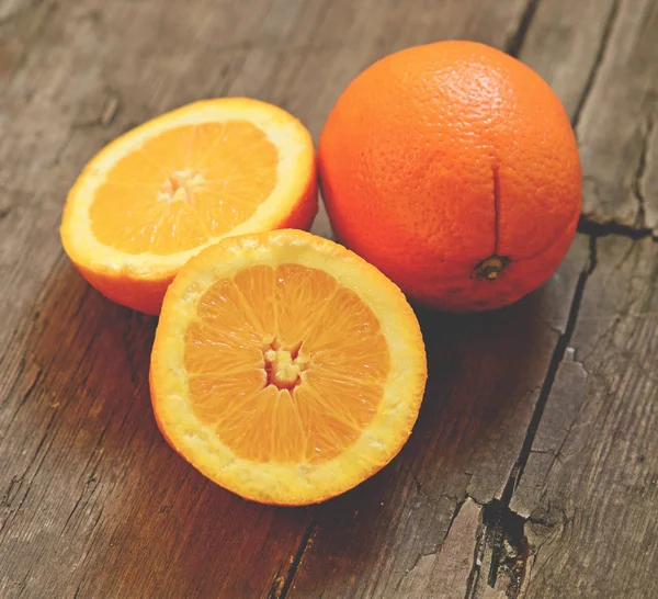 Fresh orange on wooden backgroud — Stock Photo, Image