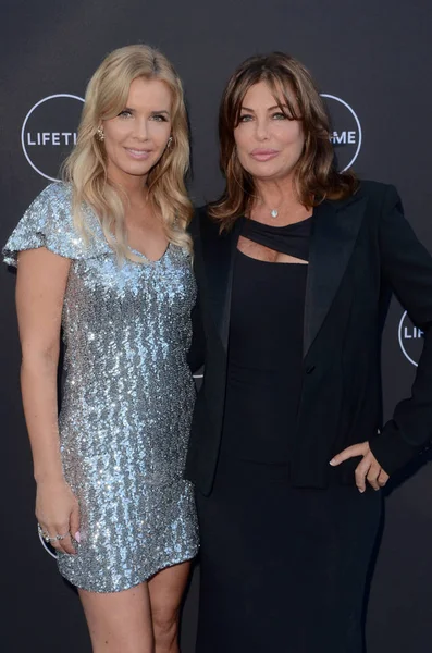 Andrea Schroder, Kelly Le Brock