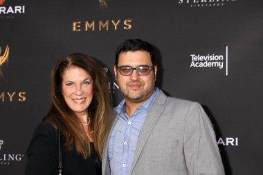 Wendy Riche, Gregori J Martin