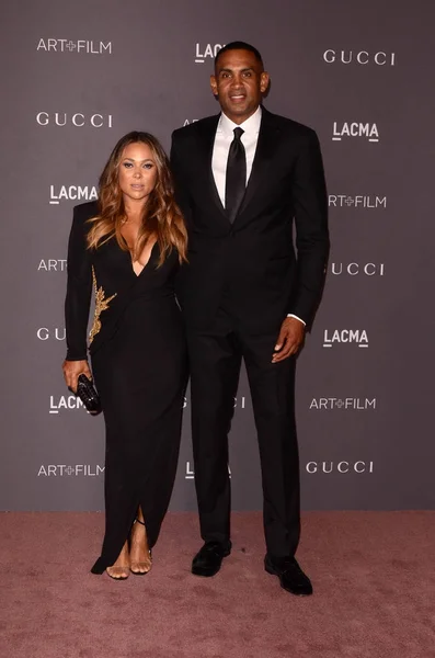 Basketballer Grant Hill with singer Tamia Hil — Stock Photo, Image