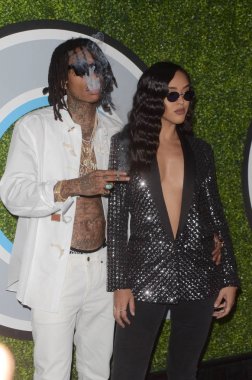 Şarkıcı Wiz Kongre ve Sergi Sarayı ve Izabela Guedes Gq adamlara yıl 2017 parti, Chateau Marmont, Los Angeles, Ca