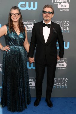 Gisele Schmidt, Gary Oldman