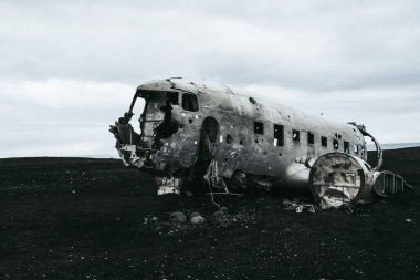 Wrecked plane on the black sand beach in Iceland.