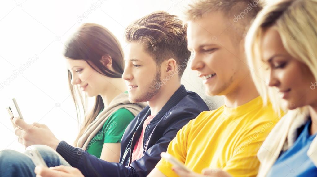 Group of teenage students and teacher