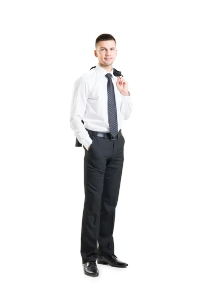 Young businessman with jacket behind his back — Stock Photo, Image