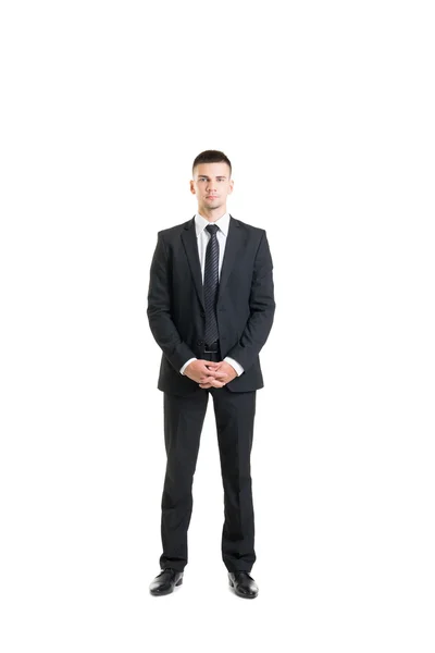 Ung och säker affärsman i svart kostym — Stockfoto