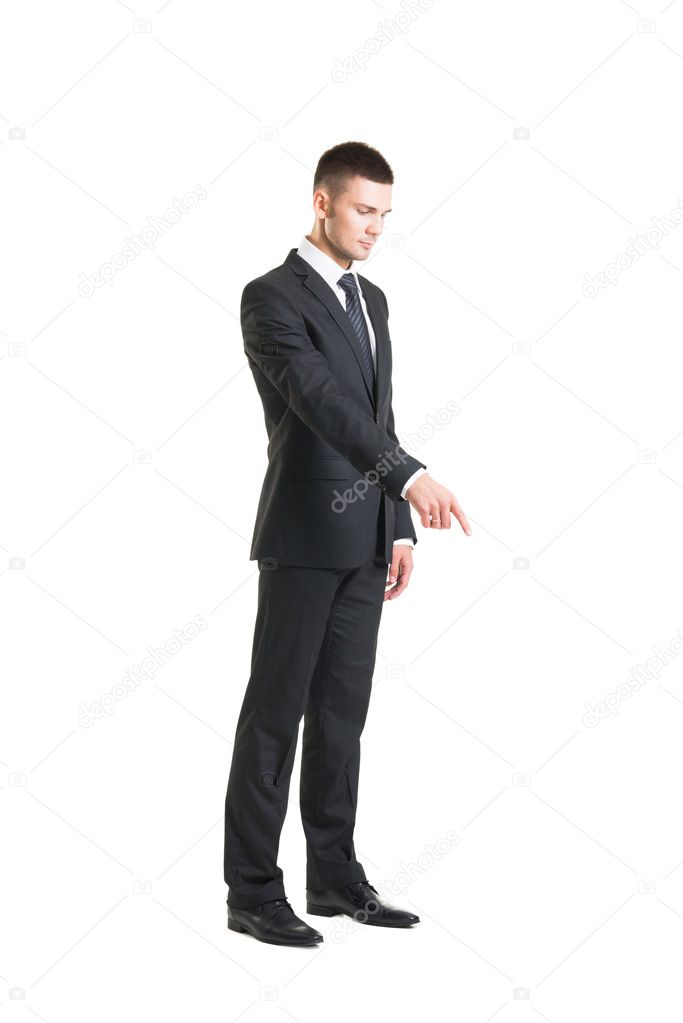 Young and confident businessman in black suit
