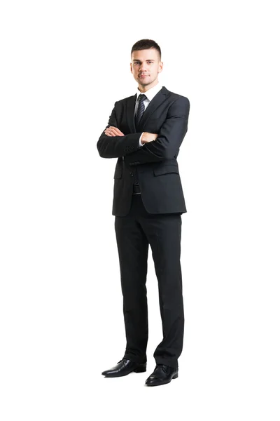 Молодий і впевнений бізнесмен в чорному костюмі — стокове фото