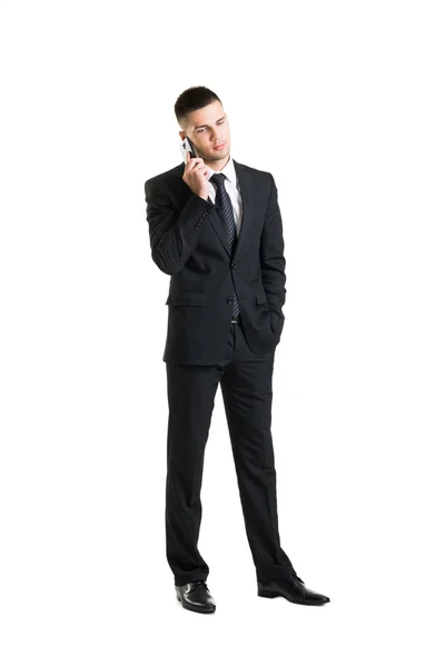 Giovane e fiducioso uomo d'affari in abito nero — Foto Stock