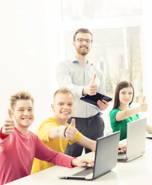 Group of students and teacher — Stock Photo, Image