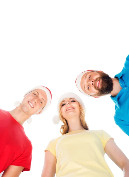 Gruppo di giovani in cappelli natalizi — Foto Stock