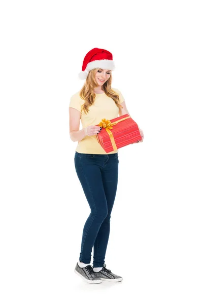 Ung kvinna i röd santa hatt — Stockfoto
