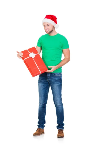 Young man in red Santa hat — Stock Photo, Image