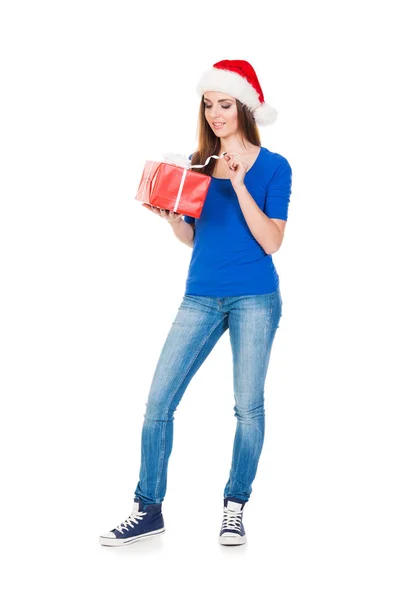 Genç kadın kırmızı santa şapka — Stok fotoğraf
