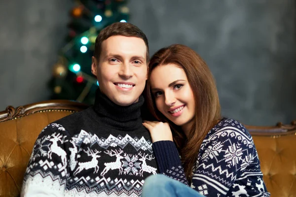 Happy couple near Christmas tree — Stock Photo, Image