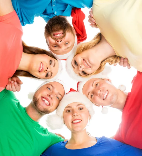 Groep jongeren in Kerstmis hoeden — Stockfoto