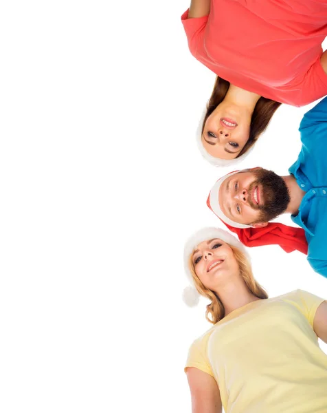 Group of young people in Christmas hats — Stock Photo, Image