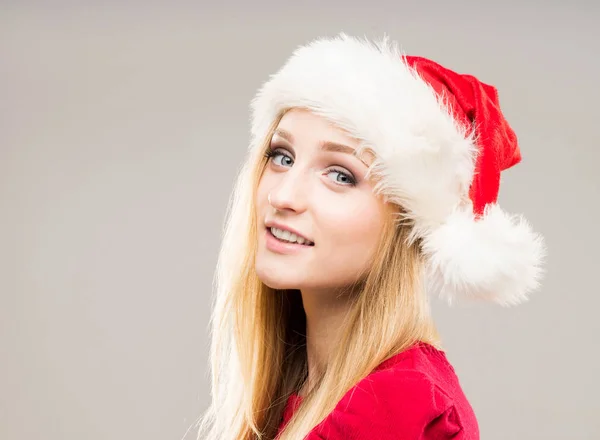 Adolescent fille en rouge Santa chapeau Images De Stock Libres De Droits