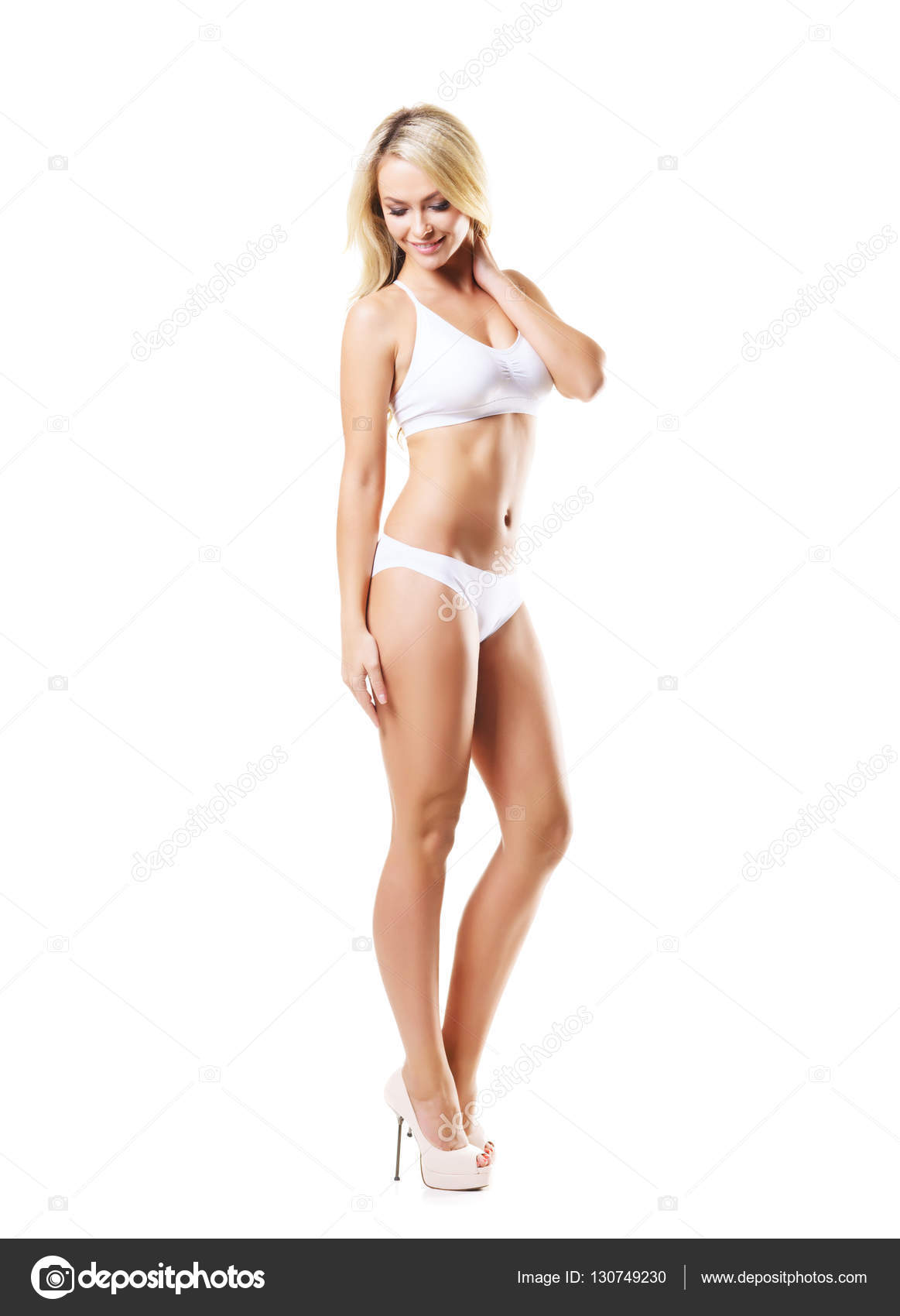 Woman in white sporty lingerie Stock Photo by ©shmeljov 108209626