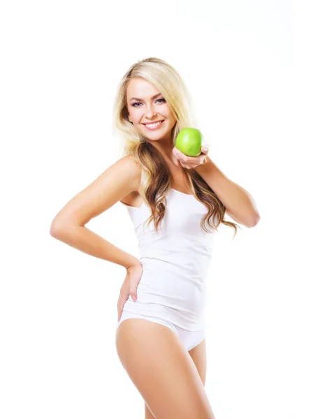 Kobieta w białej bieliźnie z zielonym jabłkiem — Zdjęcie stockowe