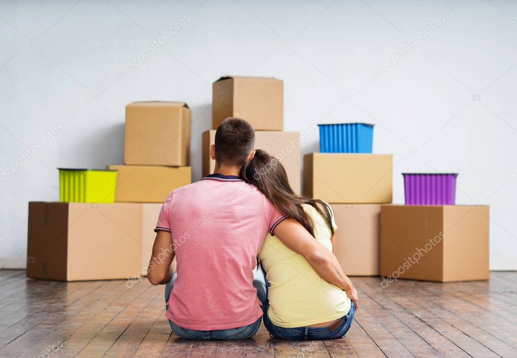 happy couple moving to new home