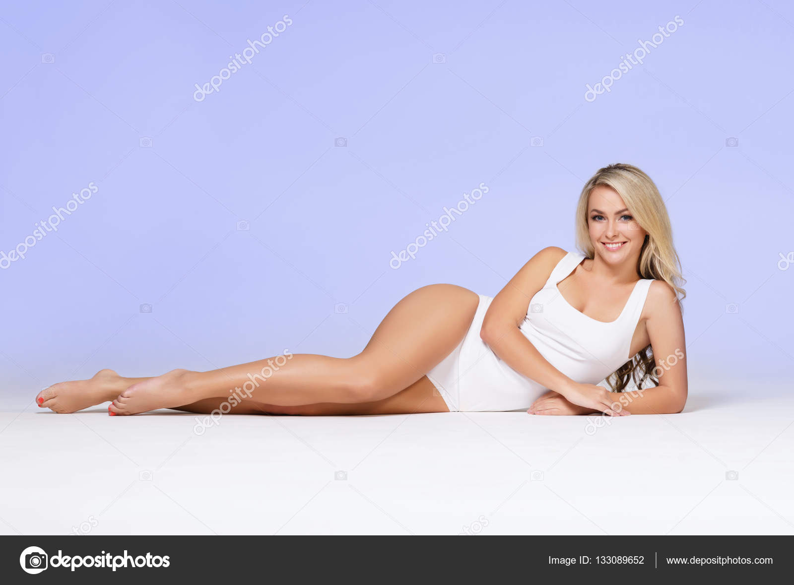 Woman in white sporty lingerie Stock Photo by ©shmeljov 108209626
