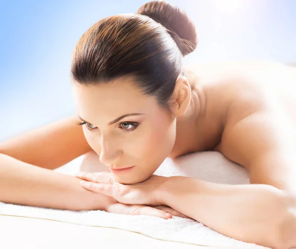 Young and natural woman on spa massage — Stock Photo, Image