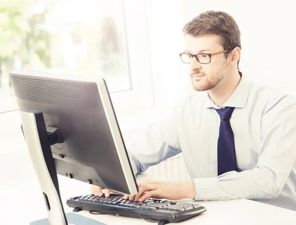 Businessman at work in office Stock Photo