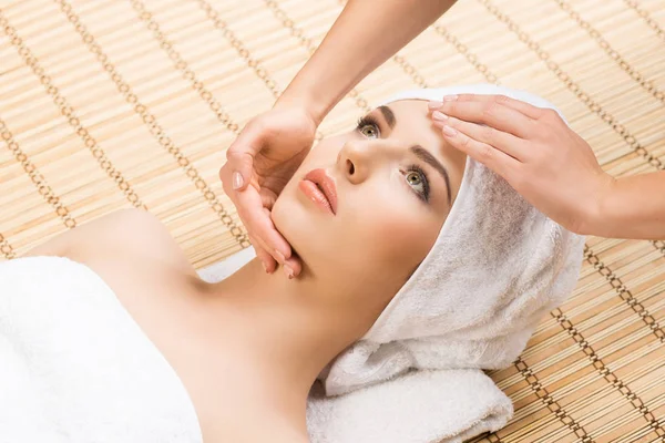 Young woman wrapped in towel — Stock Photo, Image