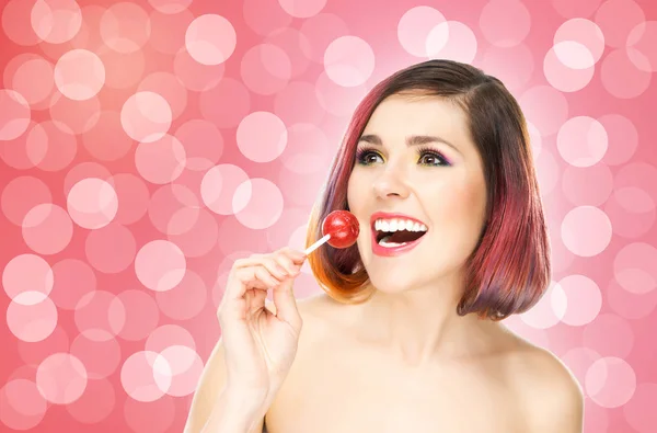 Glad kvinna med lollipop — Stockfoto