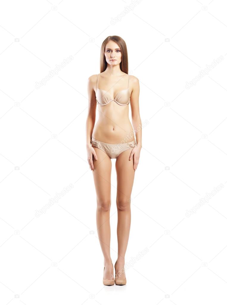 young woman in beige lingerie