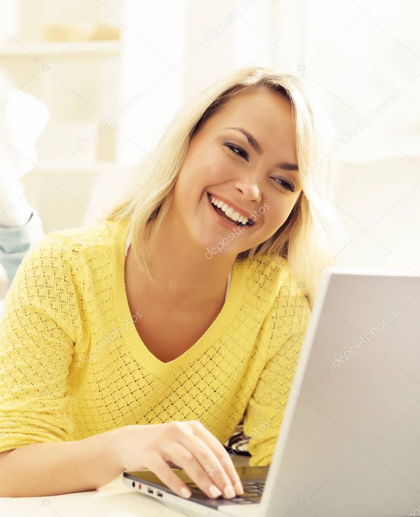 attractive young woman with laptop