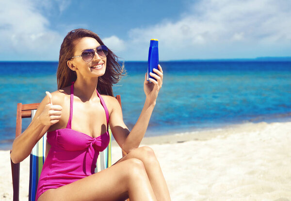 beautiful woman relaxing on summer beach