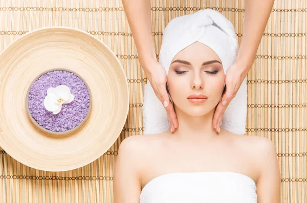 Young woman on spa massage procedure — Stock Photo, Image