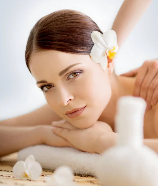 Young and natural woman on spa massage — Stock Photo, Image