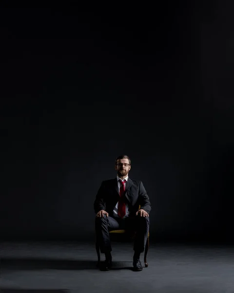 Businessman in black suit — Stock Photo, Image