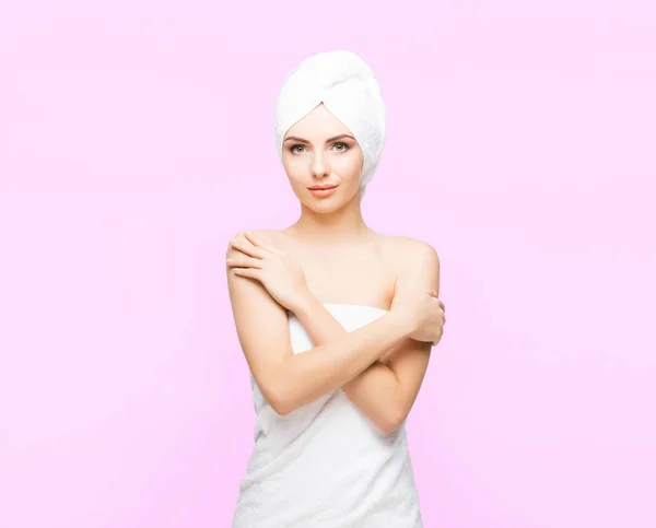 Young woman wrapped in towel — Stock Photo, Image