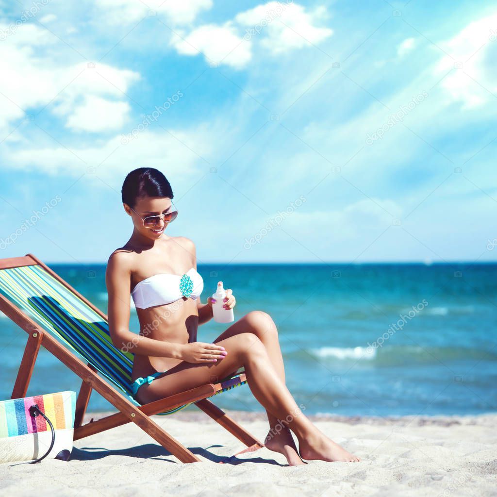 beautiful woman relaxing on summer beach