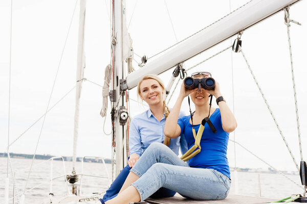young women on yacht