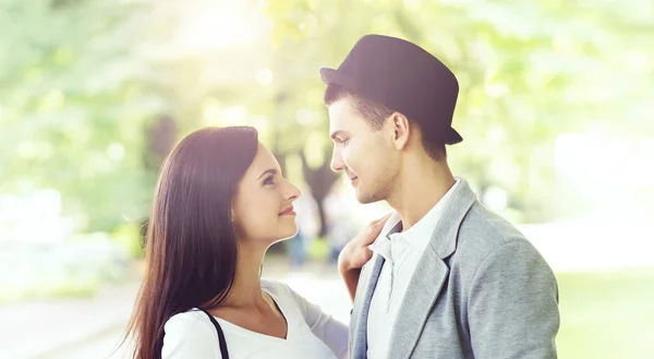 Young happy couple in park