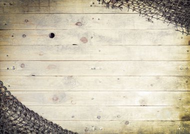 Balık ağlarına ahşap plakalar üzerinde