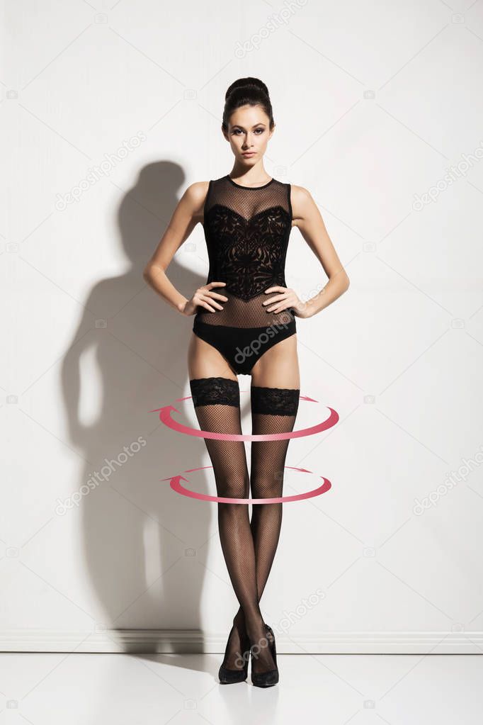Beautiful slim woman in stockings and underware